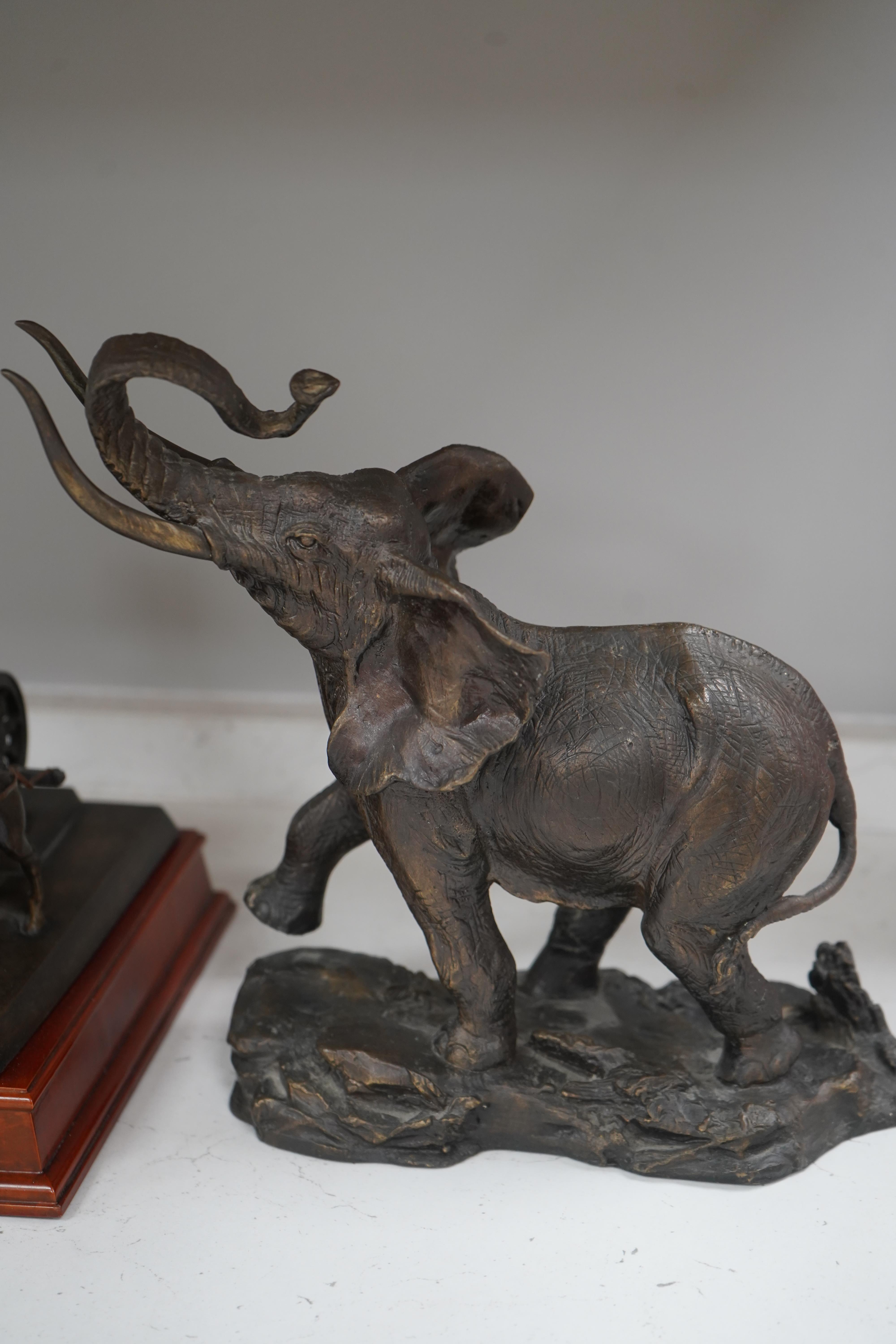 A Franklin Mint bronzed figure of an elephant, 'Giant of the Serengeti', and a Franklin Mint bronzed model 'Quadriga', on wooden plinth, with title plaque, largest 23.5cm. Condition - good